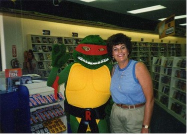 Diane Tipton and her youngest son at his summer job in college. "My son the scholar..."